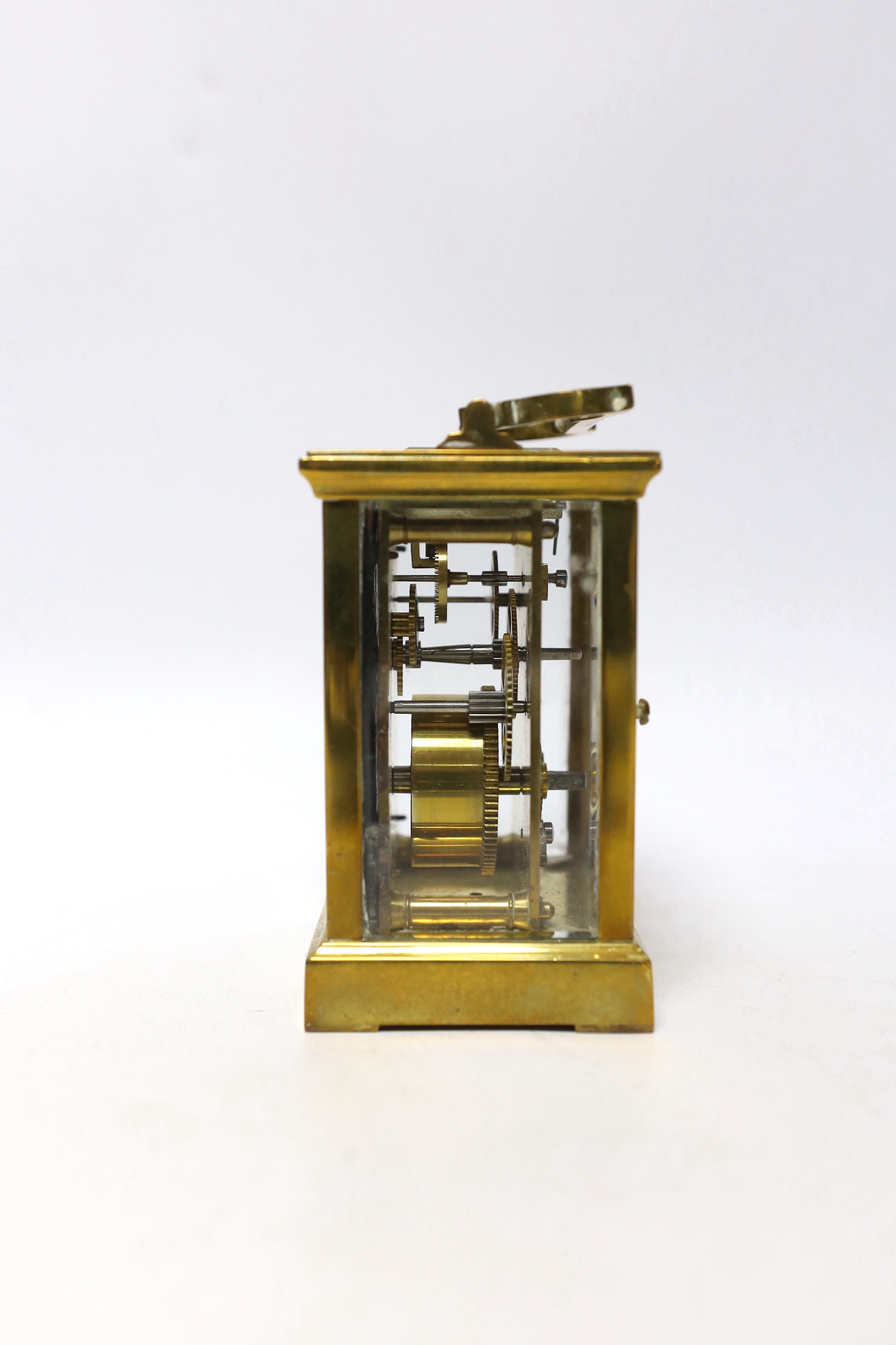 A cased brass carriage timepiece, 14cm high